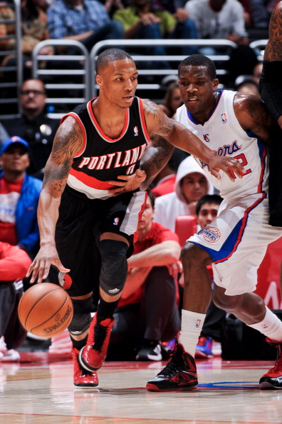  莫兰特禁赛归来率队击败开拓者  